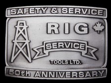 MA05142 2002  RIG SERVICE TOOLS LTD.  50th ANNIVERSARY PEWTER OILFIELD BUCKLE