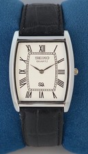 Seiko Slim White Dial Black Faux Band SS Case Quartz Men's Wrist Watch