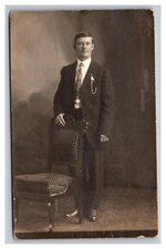 Vintage 1910's RPPC Postcard - Studio Portrait Young Businessman in Nice Suit