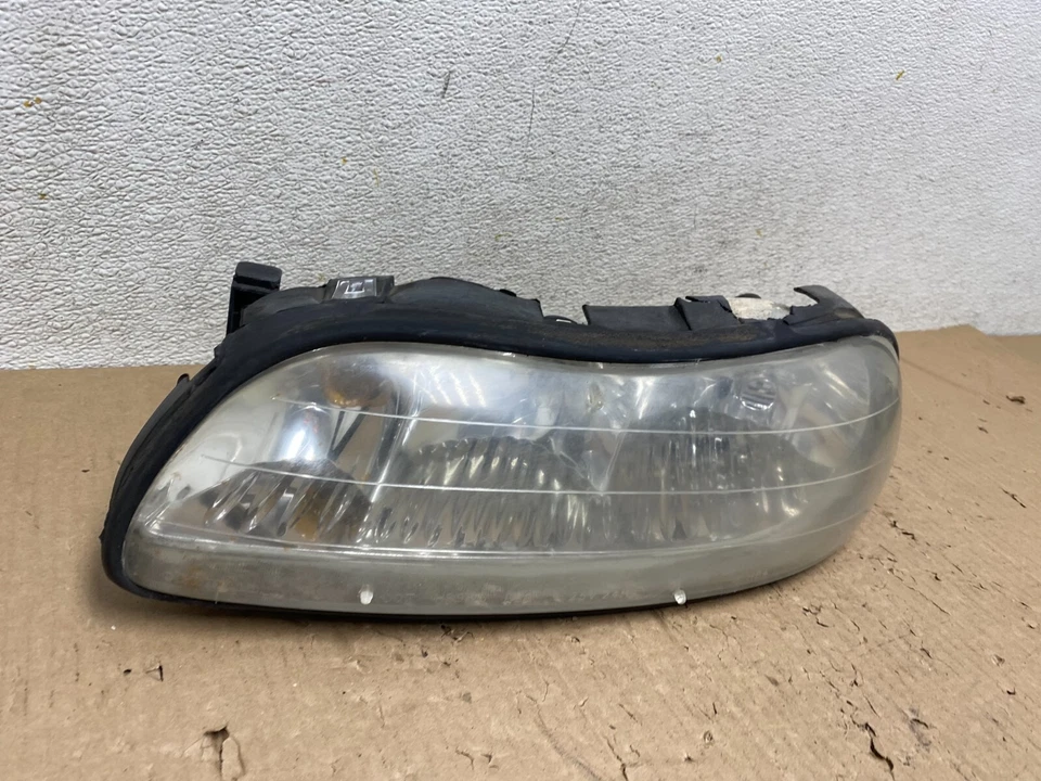 Faro lateral izquierdo Chevrolet Malibu 1997 a 2003 conductor J2350 OEM DW Foto 3 de 4