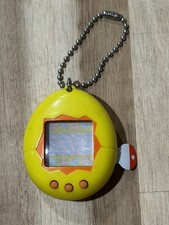 1997 Bandai Tamagotchi Virtual Pet Yellow  Orange New With Battery Plug