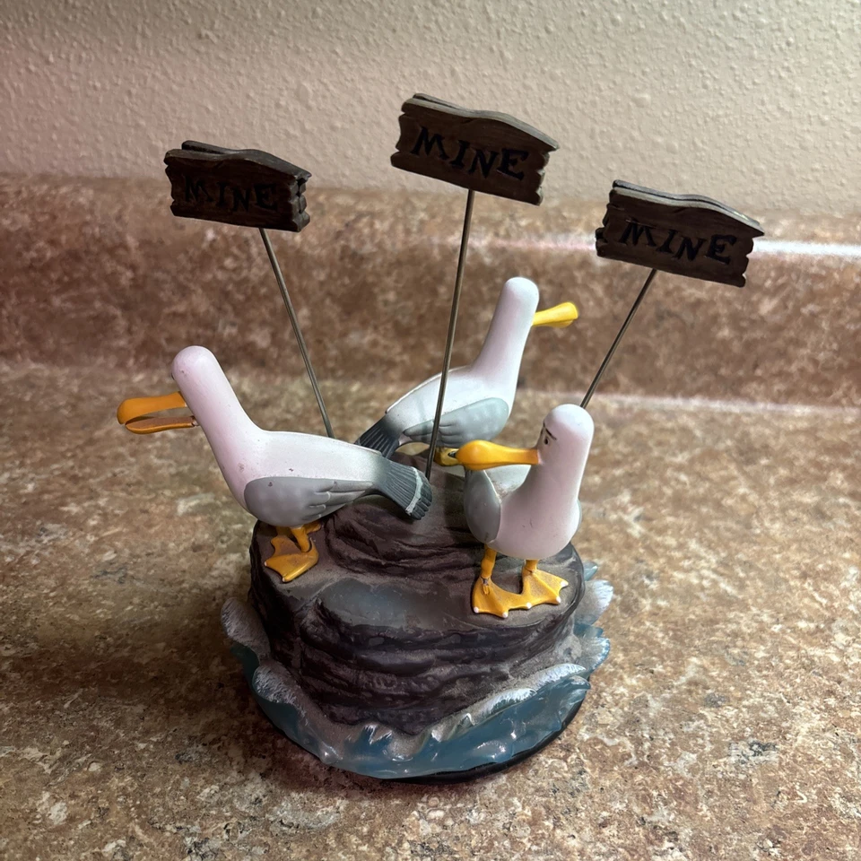 Figura de recuerdo del parque Disney gaviotas encontrando a Nemo mina mina nota/foto holde Foto 2 de 4