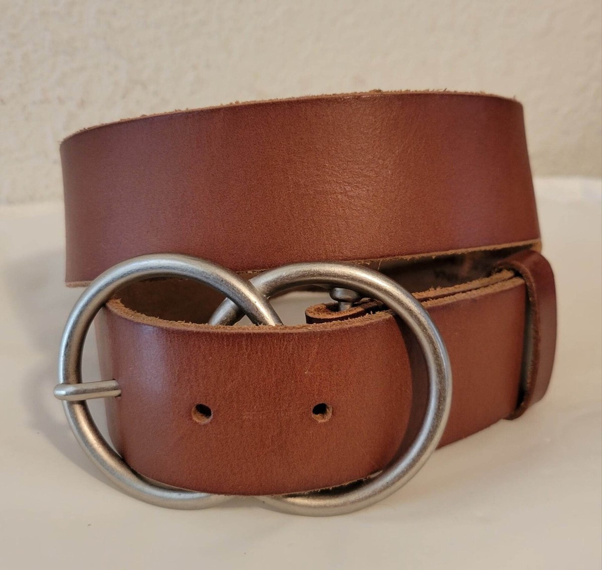 Urban outfitters ? cow Brown leather belt size L. Nice 