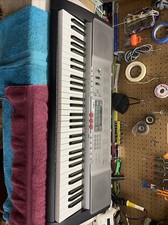 Casio LK-230 Electronic 61-Keys Personal Ligh...