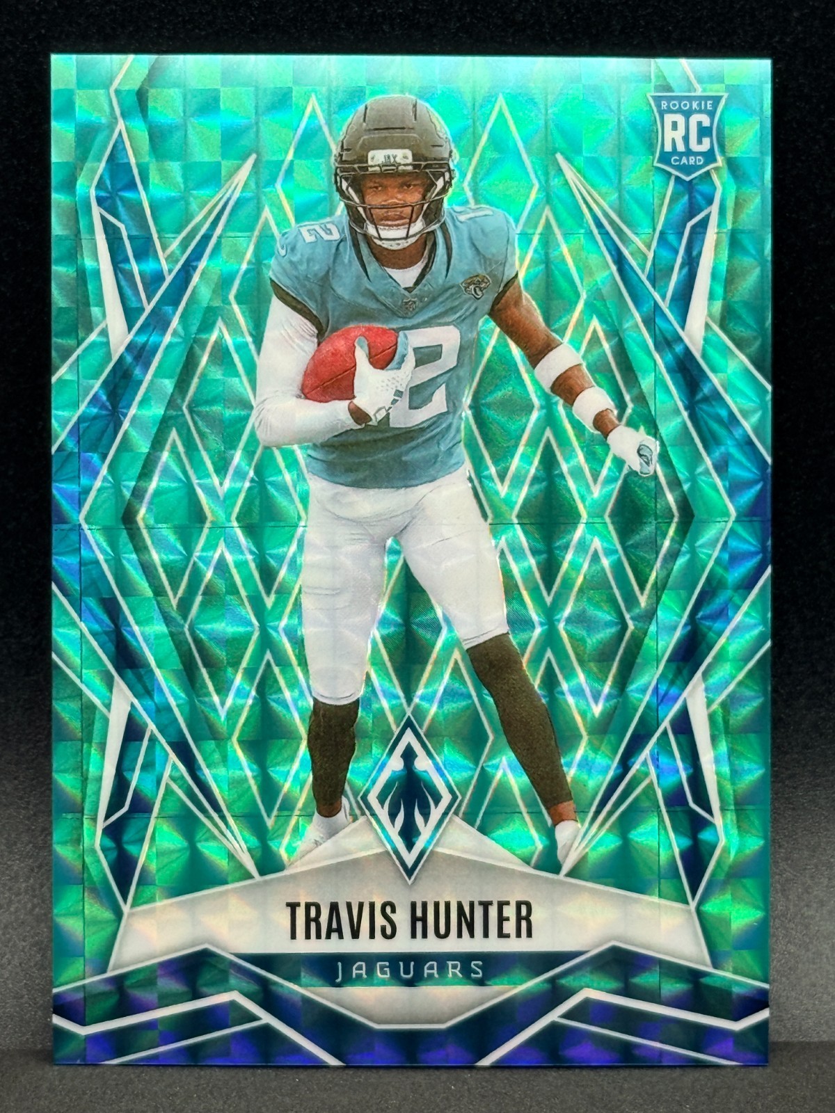 2025 Panini Phoenix - Rookies Travis Hunter #157 Teal Pyramids /225 (RC)