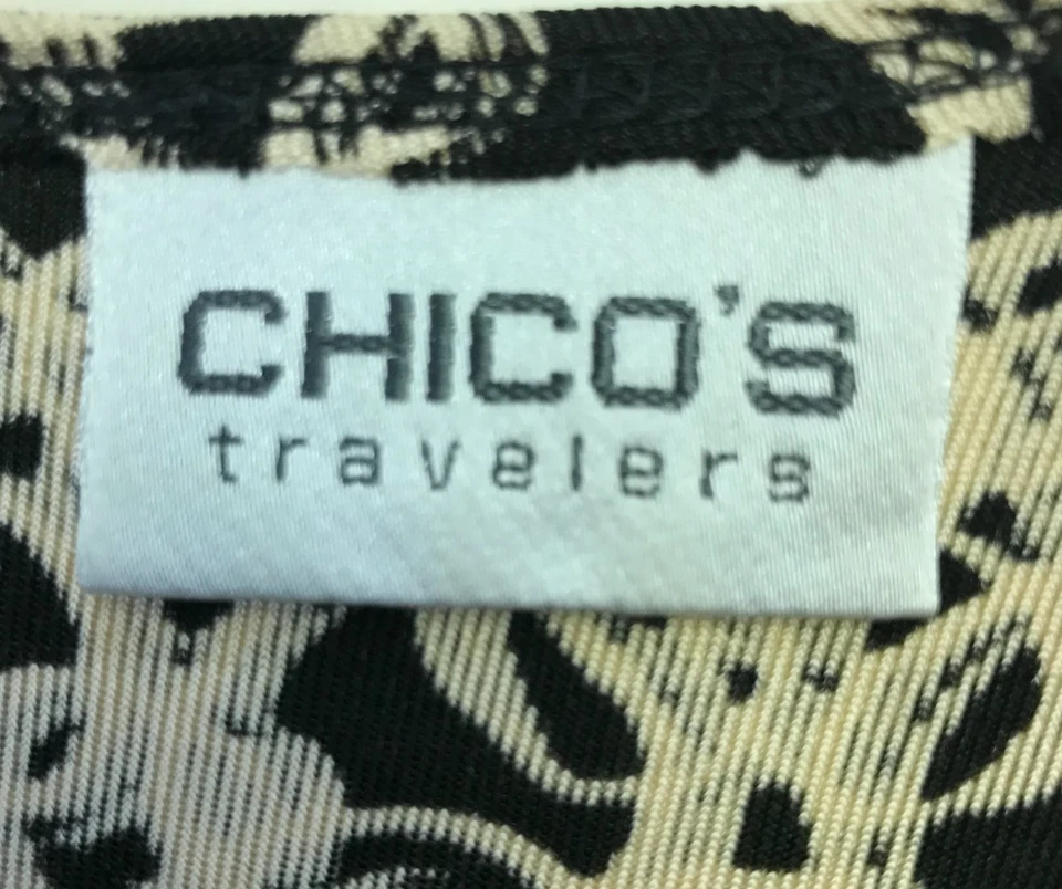 Vestido envolvente sin mangas Chico's Travelers talla 0 negro tostado midi elástico pequeño Foto 2 de 4