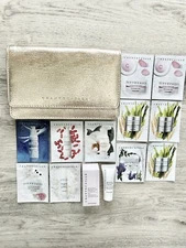 Chantecaille Skin Care Set with Beautiful Gold Clutch Makeup Cosmetic Bag