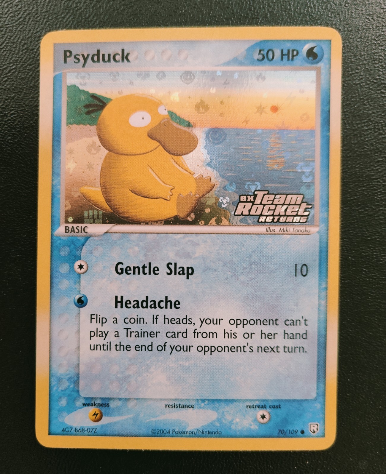 2004 Psyduck 70/109- EX Team Rocket Returns- Reverse Holo- Stamped- Rare-M/NM💎