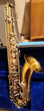 Tenor Saxophone with Case and Accessories.