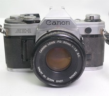 Vtg CANON AE-1 Film Camera 50mm Lens outfit W/ New Battery TESTED