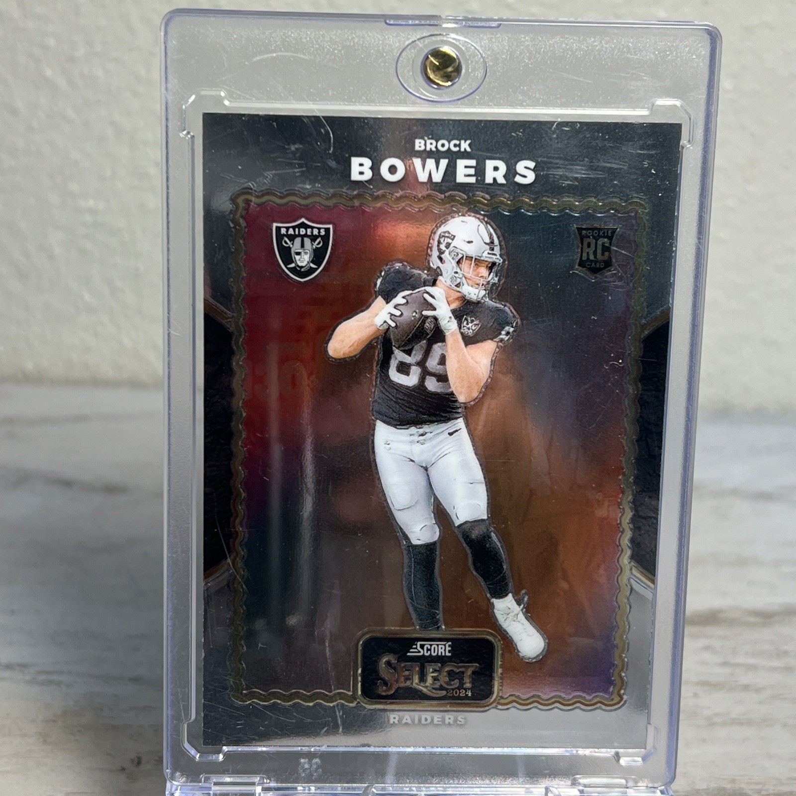 2024 Panini Select - Score Select Throwback Brock Bowers #20 (RC)