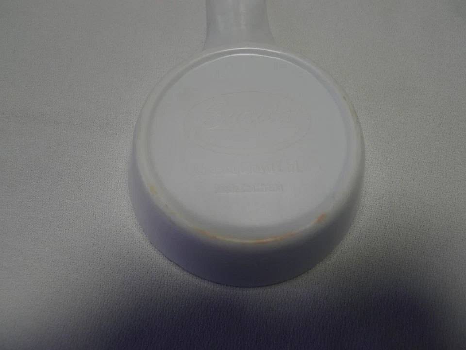 Reposacuchara de melamina Corelle Pink Trio Eurita Reston Lloyd Ltd. Foto 3 de 4