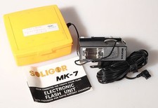 SOLIGOR MK-7 FLASH UNIT W/ A/C CABLE BUILT IN PC CORD CASE AND OWNERS MANUAL