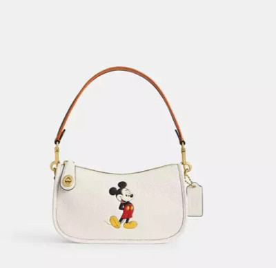 Disney X Coach Swinger Bag In Regenerative Leather With