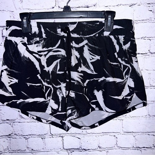 Pantalones cortos de running DSG para mujer blancos y negros medianos - Imagen 1 de 7