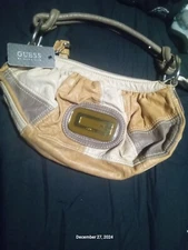 This Is An Official Guess Purse.. NWT As You Can See What It Retails For..