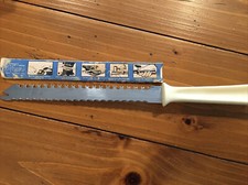 Vintage QUIKUT Stainless Knife With White Handle Made In USA Cuts Trees & Bread