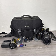 Nikon D3000 DSLR Camera with 18-55mm f/3.5-5.6G VR Lens And Accessories