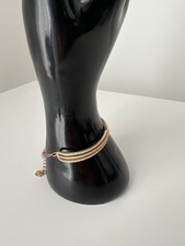 Swarovski | Triple Row Gold Tone Bracelet | One Crystal Missing