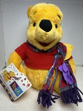 Vintage "Blustery Day Pooh" plush stuffed animal manufactured by Mattel in 1998.
