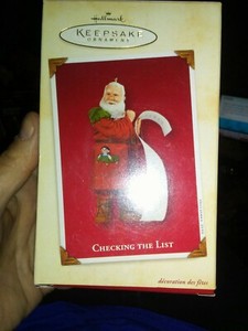 2002 HALLMARK KEEPSAKE CHECKING THE LIST SANTA ORNAMENT NEW