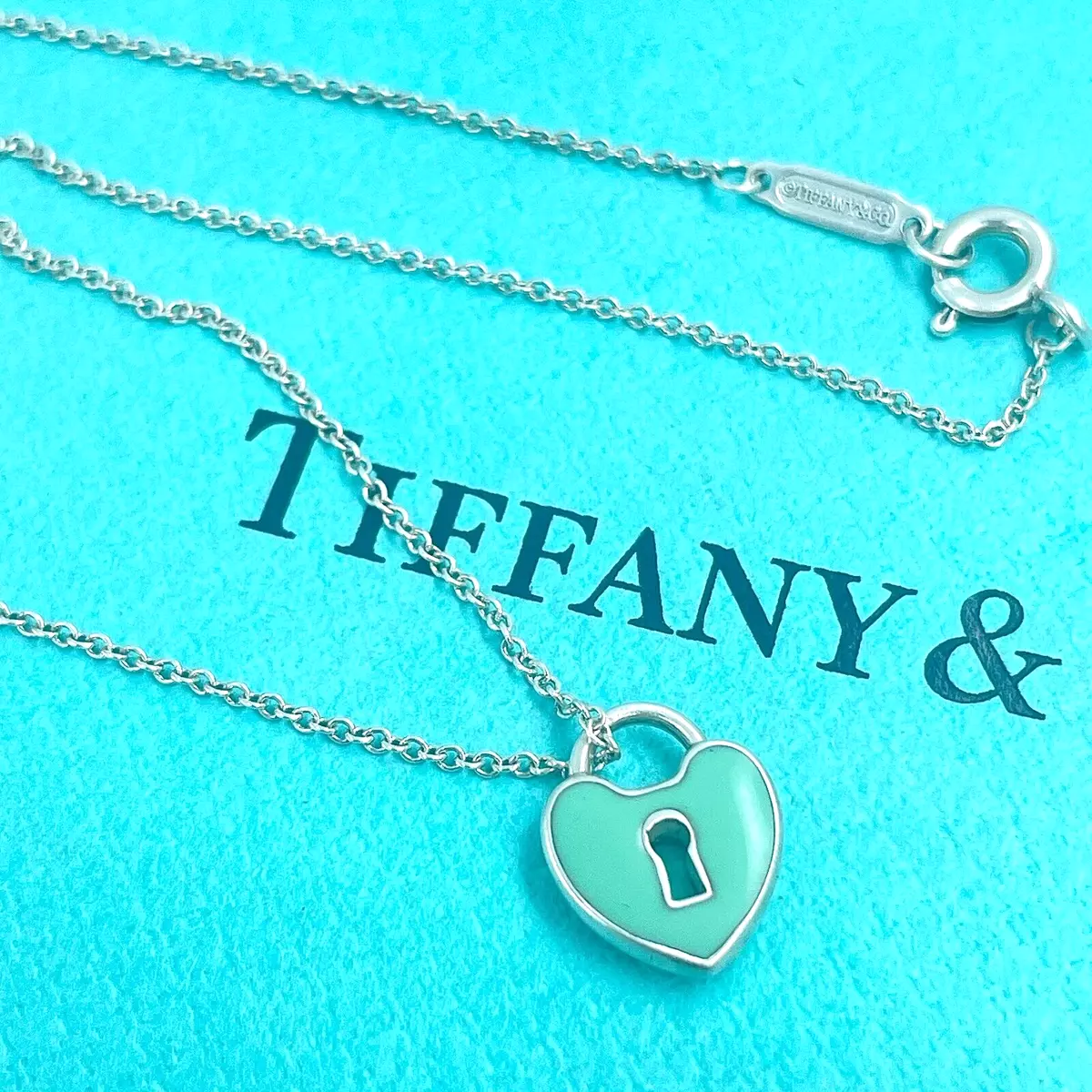 Tiffany Co.Blue Enamel Keyhole Lock Mini Heart Pendant Silver