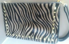 Tano Leather Animal Print Shoulder Bag Zipper Back Gold Tone Accents Zip Black