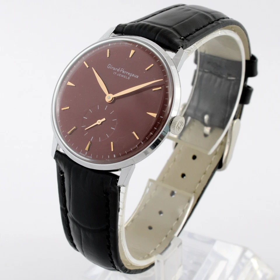 RELOJ DE VESTIR SUIZO GENUINO GIRARD PERREGAUX CUERDA MANUAL BONITO ESFERA BORGOÑA Foto 2 de 4