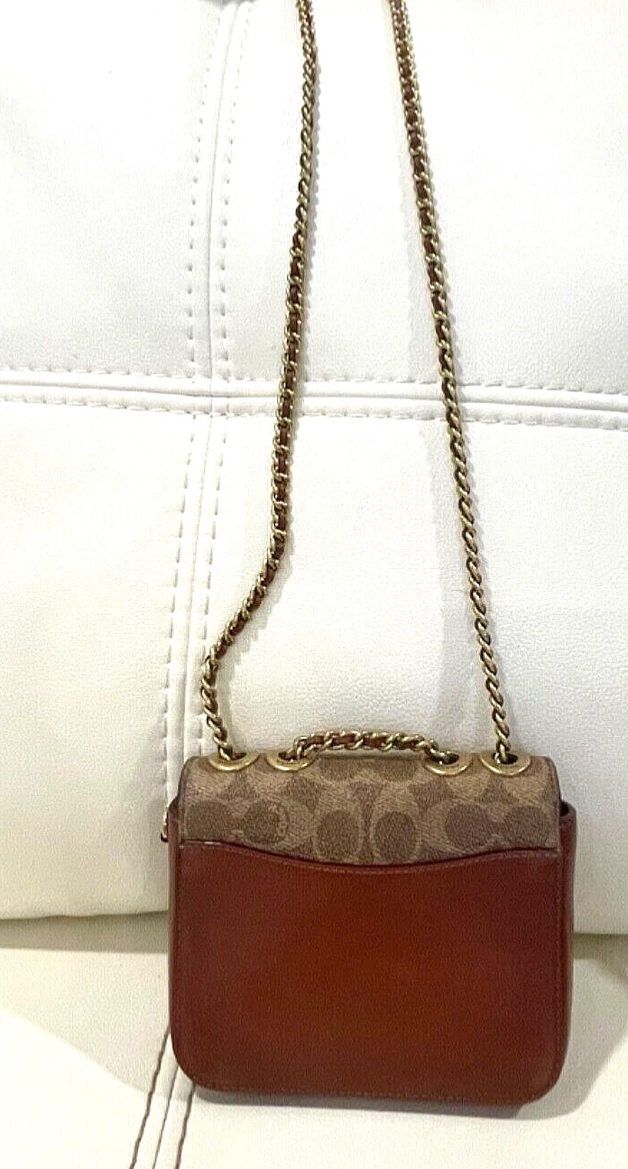 Mini Coach Madison in pelle tela rivestita con firma tè rosa lucchetto.