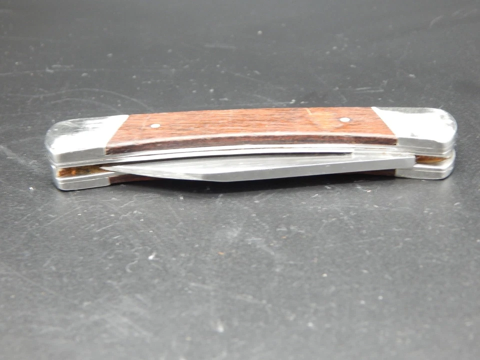 Navaja de bolsillo plegable vintage Buck 703 U.S.A mango de madera marrón Foto 3 de 4