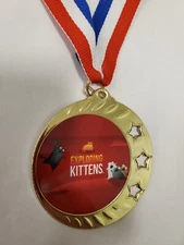Exploding Kittens card game gold color medal award winner, with your engraving
