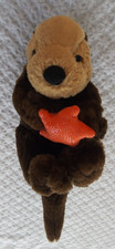 Unipak Sea Otter Plush Holding Orange Starfish Soft Stuffed Animal Toy Lovey
