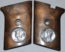 Phoenix Arms Raven 25 ACP pistol grips flip safety brown with mercury dimes