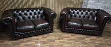 Chesterfield 2 seater sofas a matching pair in dark ox blood red leather