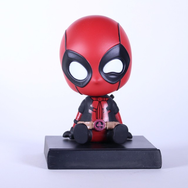 bobble head dashboard figures