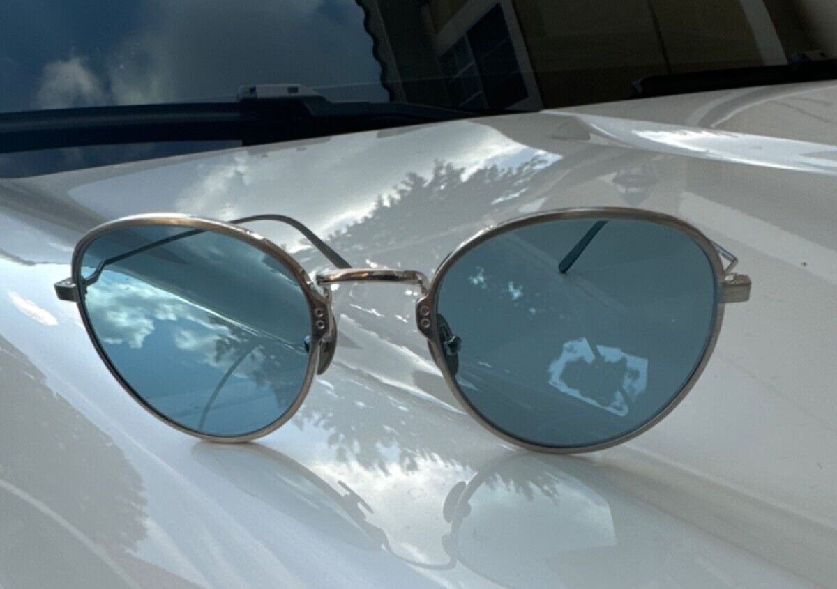 Titanium PRADA Sunglasses. Made in Japan. Quality. New. With box