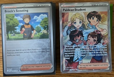 Pokemon Trainer Brock's Scouting Paldean Student a little over 100 cards mix.