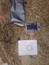 unbranded 48MP compact digital camera featuring a silver finish, an f 3.97mm...