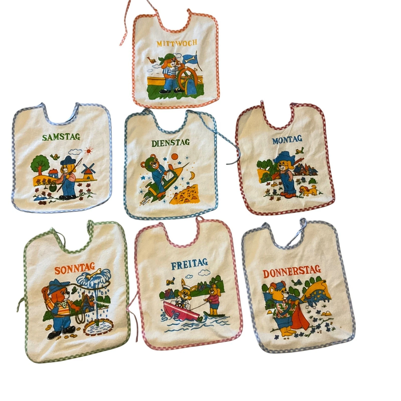 Bambino Vintage Baby Bibs Set 7 Days of Week Cartoon Animals German
Opens in a new window or tab