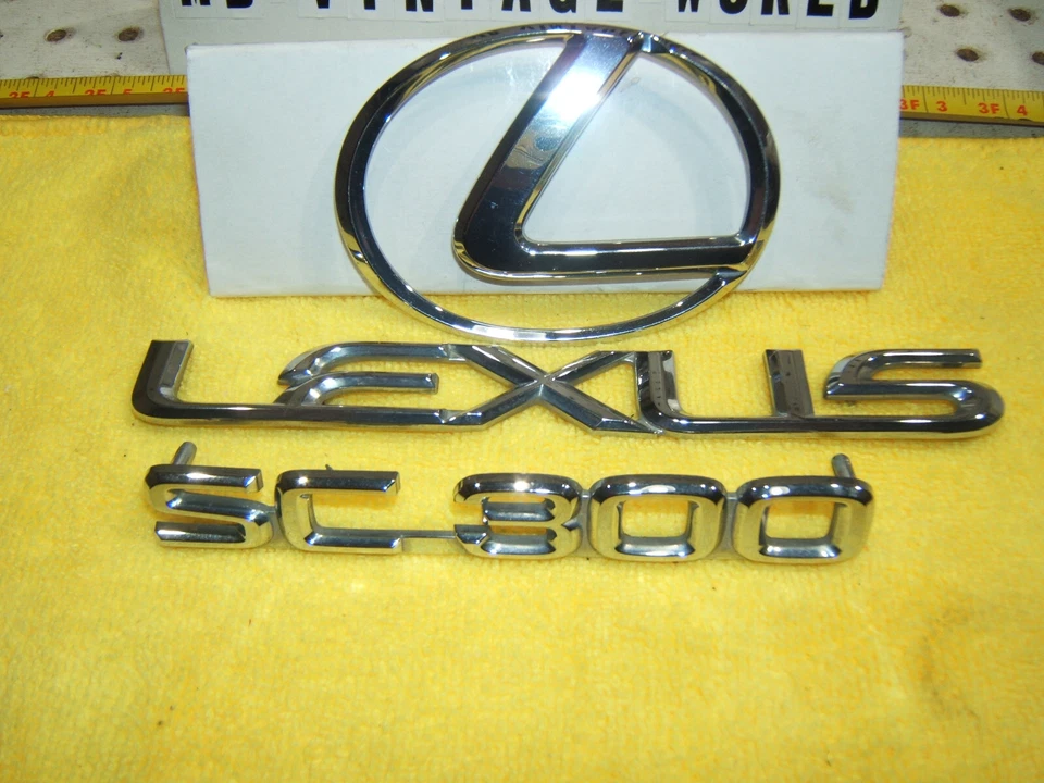 Original Lexus 92-96 SC300 cromado maletero trasero plástico Lexus OEM 3 emblemas Foto 3 de 4