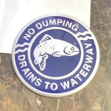 Vintage No Dumping Drains to Waterway Metal Sign with Fish Graphic