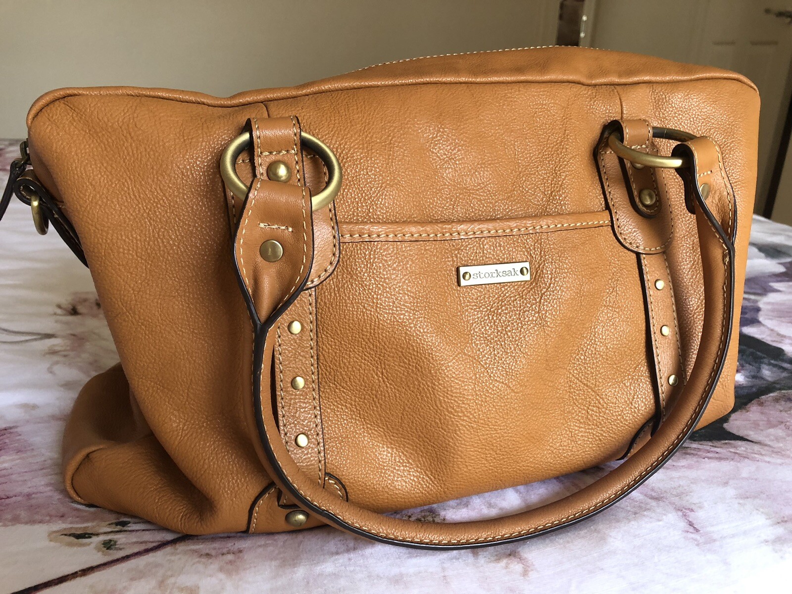 tan leather nappy bag
