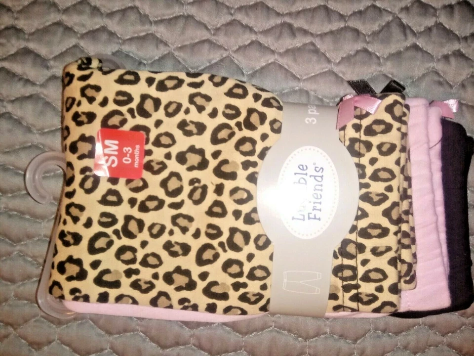 Pantalones al tobillo cónicos para bebé Luvable Friends 3 piezas, leopardo negro y rosa talla 0-3 meses Foto 2 de 2