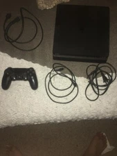 playstation 4 slim (FOR SELL AS IS COMES WITH EVERYTHING)