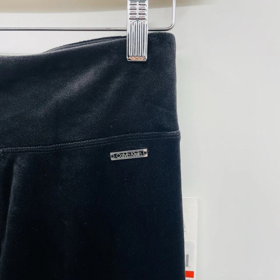 Calvin Klein Mujer Talla Pequeña PXS Pull On Terciopelo Leggings en Negro Sólido $69 Foto 3 de 4