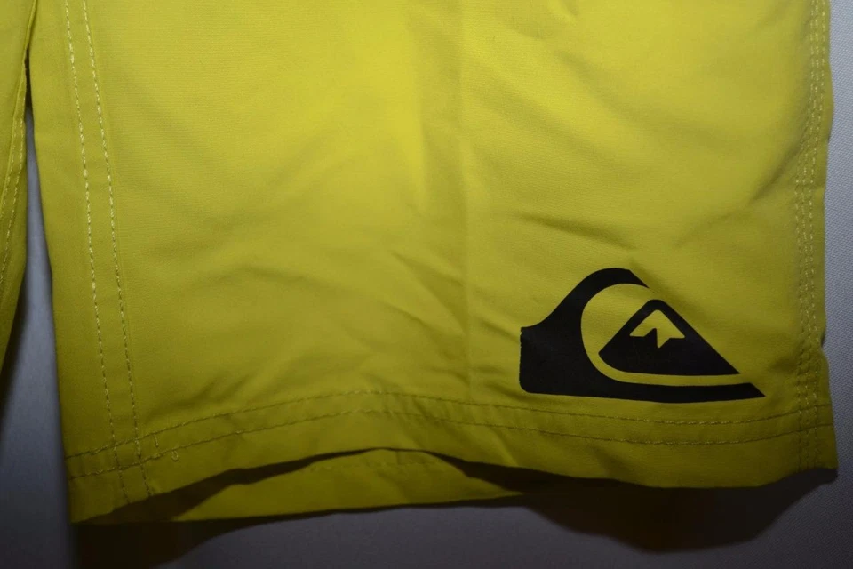 Bañador Quiksilver amarillo neón playa tabla surf pantalones cortos jóvenes niños 26 nuevo con etiquetas Foto 4 de 4