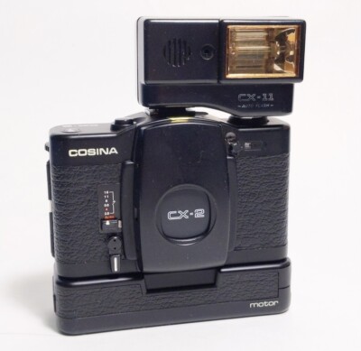 COSINA CX-2 フィルムカメラ モーター フラッシュ付き s-l400.jpg