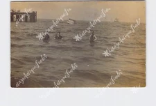 RPPC Real Photo Postcard People Playing In Ocean #3 Man With Two Women Pier Boat