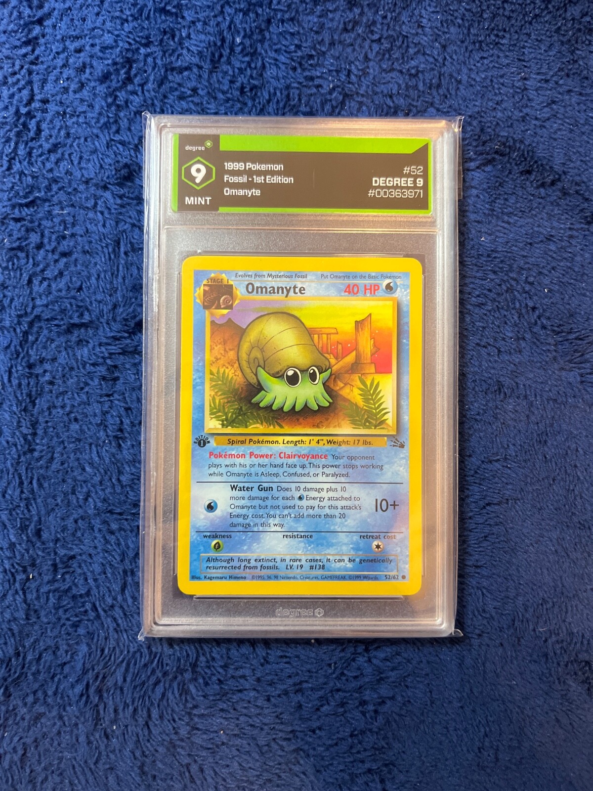 Degree 9 MINT Omanyte 1999 Fossil 1st Edition Pokemon Card 52/62