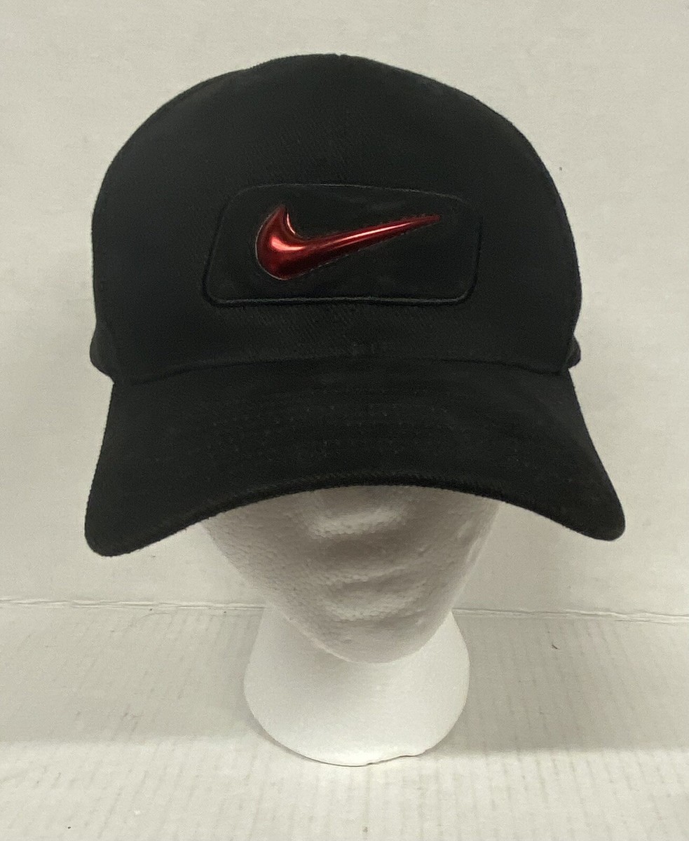 black nike hat with red swoosh